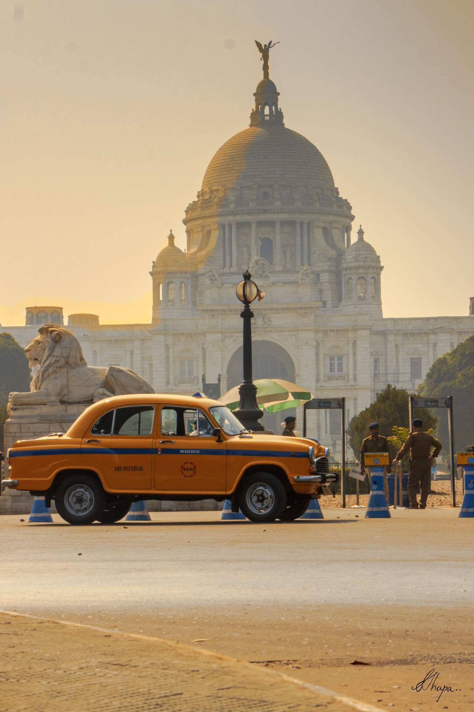Vintage Yellow taxi in-front of Victoria Memorial, Kolkata
